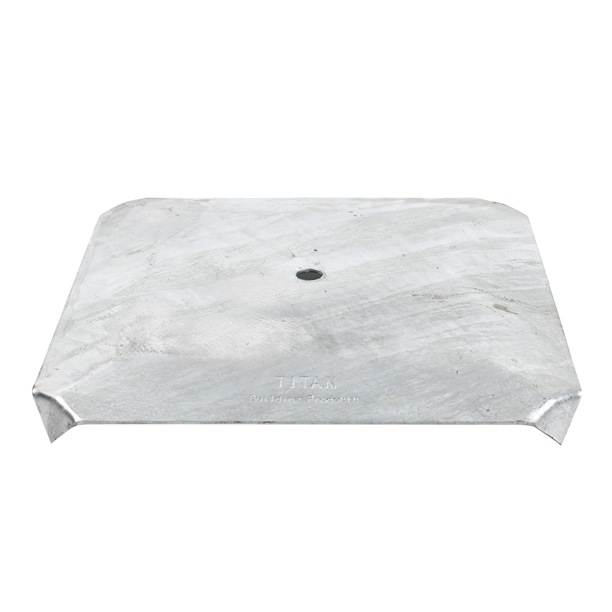 close up of  a convex galvanized load plate on a white background