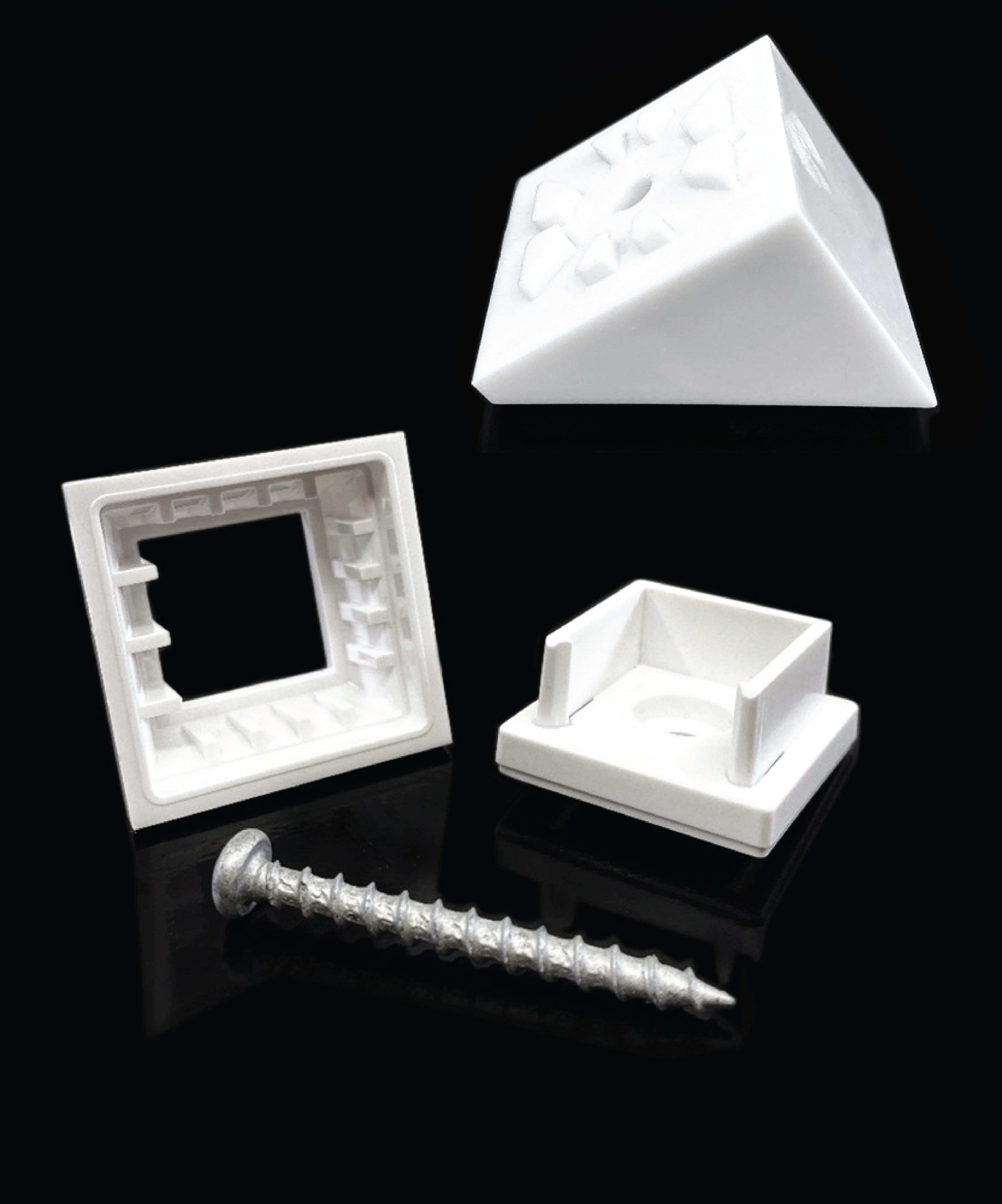 White plastic snap'n lock connector and stair adapter and a screw on a black background