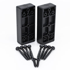 Two black polycarbonate deck rail connectors with screws laid out in front of them.